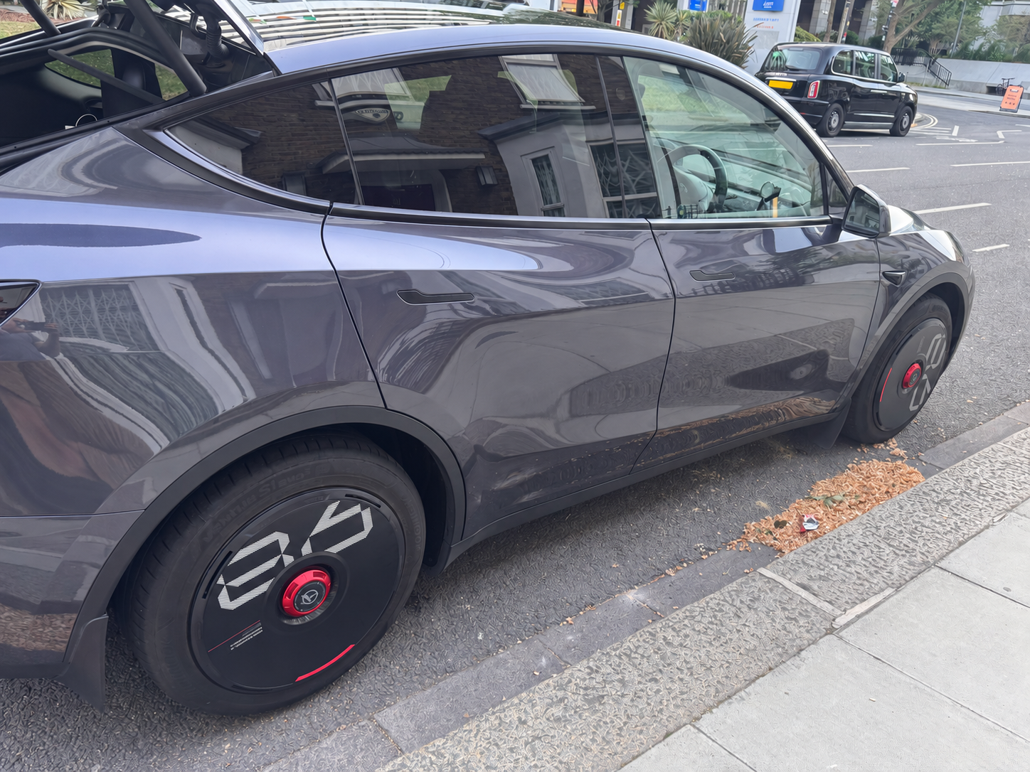 Side view of the grey Tesla Model Y